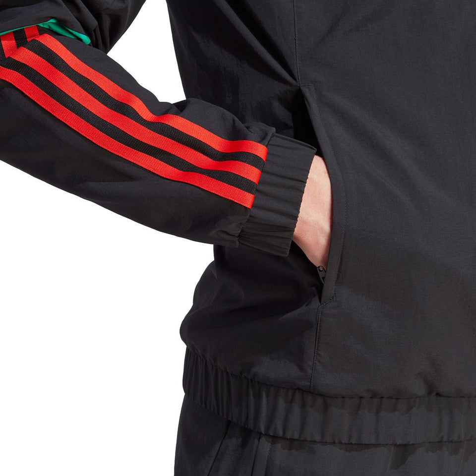 Adidas Manchester United presentation tracksuit 2023 24 with stylish stripes and functional pockets