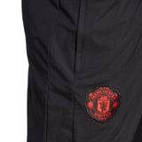 Close-up of Adidas Manchester United presentation tracksuit 2023 24 featuring the team's emblem