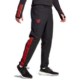Adidas Manchester United presentation tracksuit 2023 24 with red stripes and logo for soccer fans