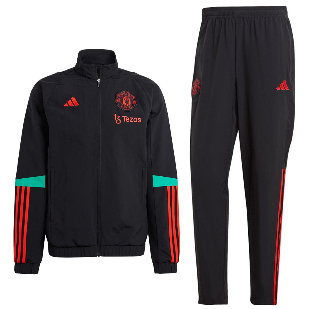 Adidas Manchester United presentation tracksuit 2023 24 featuring a black jacket and matching pants with vibrant details