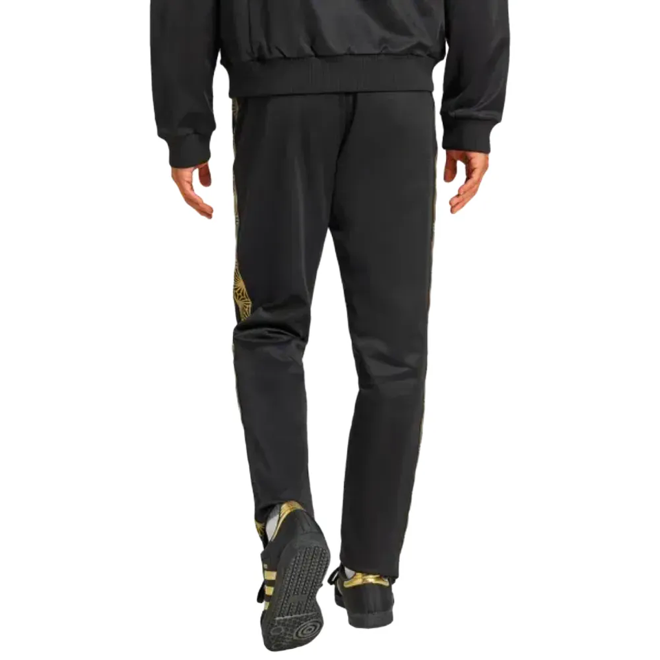 Back view of black tracksuit pants with gold crest and matching jacket Mexico Gold Cup Adidas tracksuit 2025