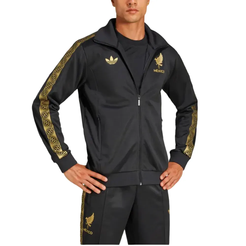 Male model wearing Mexico Gold Cup Adidas tracksuit 2025 black jacket and pants with gold eagle and patterned sleeve stripes