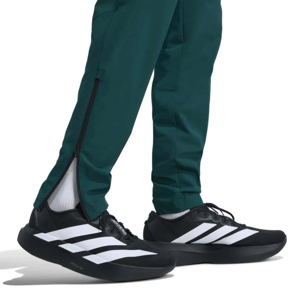 Adidas Mexico hooded tracksuit 2026 featuring zippered pants and stylish soccer shoes