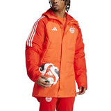 Official Bayern Munich Adidas parka in red with white stripes and team logo worn by a man holding a soccer ball