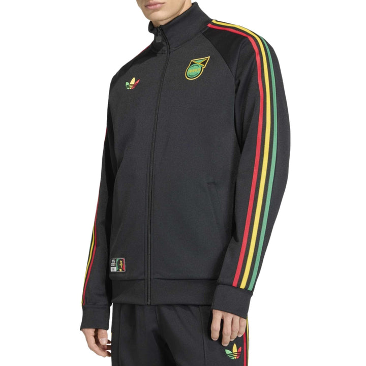 Black Adidas track jacket with red, yellow, and green stripes and logo