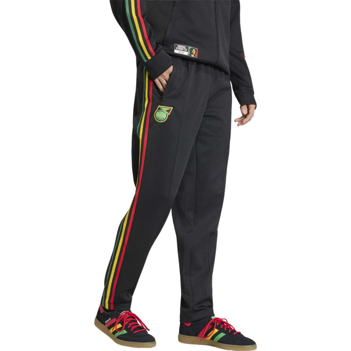 Black track pants with red, yellow, and green stripes and logo detail for a sporty look.