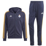 Adidas Real Madrid hooded soccer tracksuit featuring a zip-up jacket and matching pants in navy blue