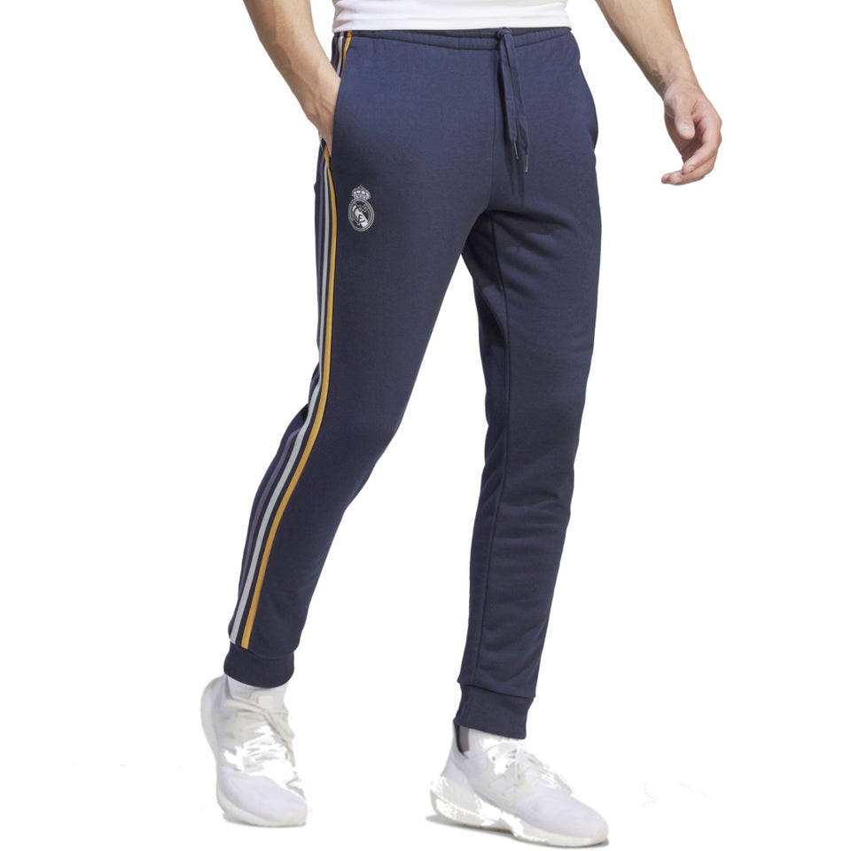 Adidas Real Madrid hooded soccer tracksuit in navy with team logo and yellow stripes