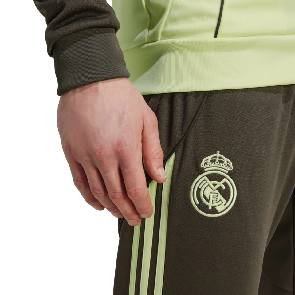 Adidas Real Madrid tracksuit 2025 featuring team logo and comfortable fit for fans and athletes