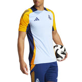 Real Madrid training kit 2024 soccer tracksuit with light blue and yellow top and navy shorts