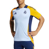 Real Madrid training kit 2024 soccer tracksuit with light blue, yellow, and navy color blocking