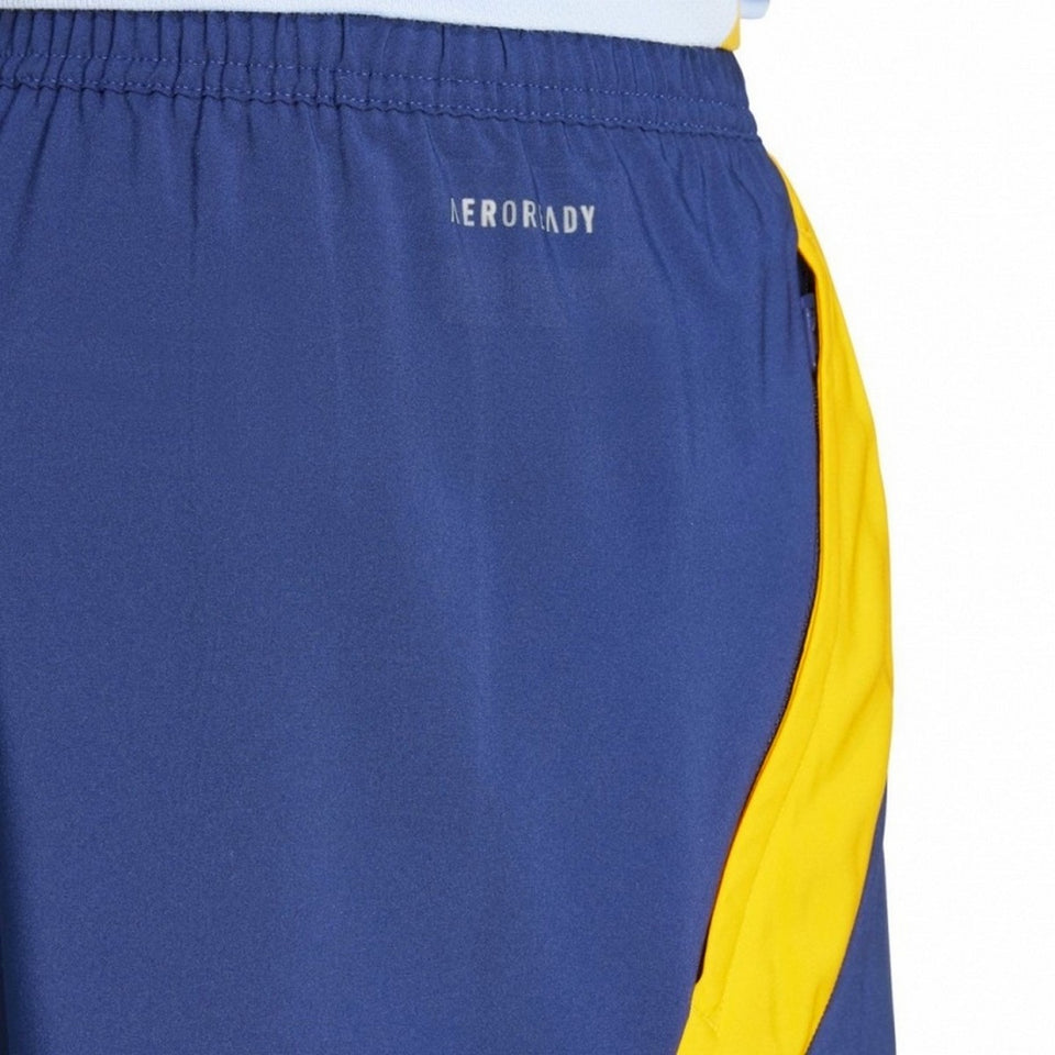 Close-up of blue and yellow Real Madrid training kit 2024 tracksuit pants with Aeroready fabric