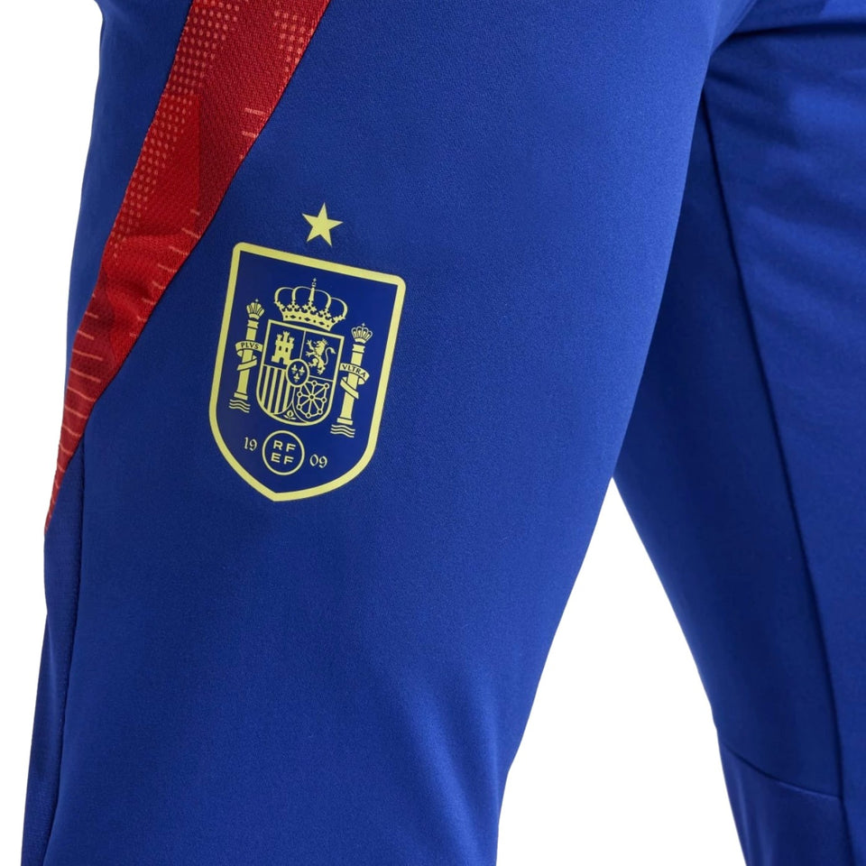 Blue soccer pants with Spain national team crest and red stripe from Spain national team tracksuit for sale
