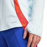 Close-up of Adidas Spain national team tracksuit for sale with white top and blue pants