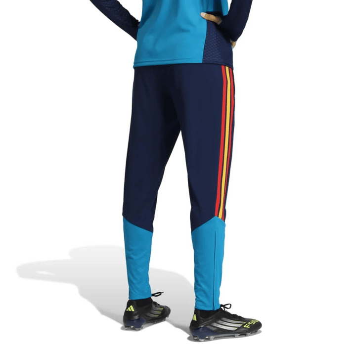Spain training technical soccer tracksuit 2026/27 by Adidas in blue with red and yellow stripes and fitted design