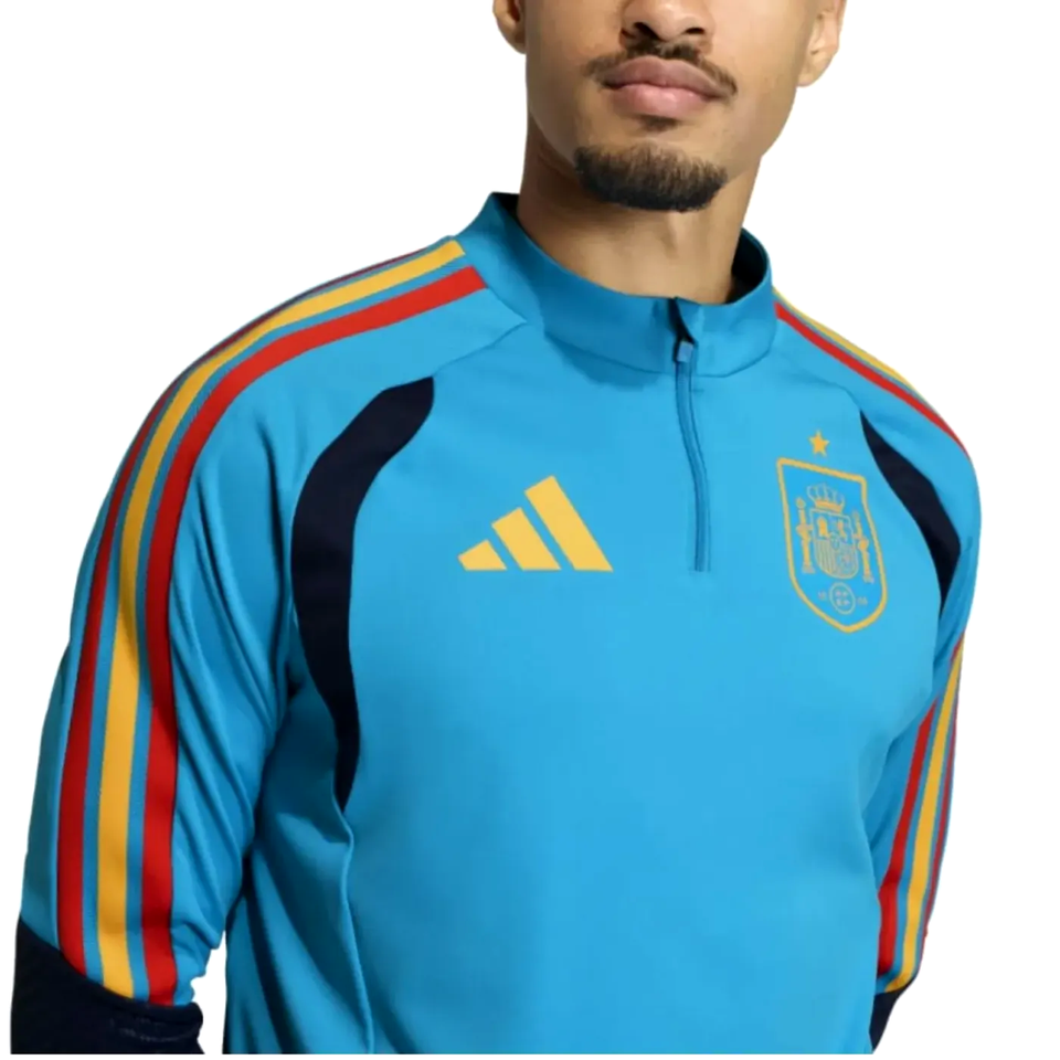 Adidas Spain training tracksuit WC 2026 featuring a blue design with colorful stripes and the Spain logo