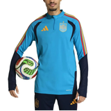 Adidas Spain training tracksuit WC 2026 featuring a blue top with red and yellow accents