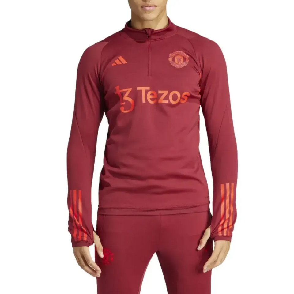 UCL Manchester United tracksuit Adidas in red with long sleeves and logo, perfect for fans and athletes