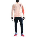 Barcelona Champions League tracksuit 2025 in peach and navy, ideal for fans and players