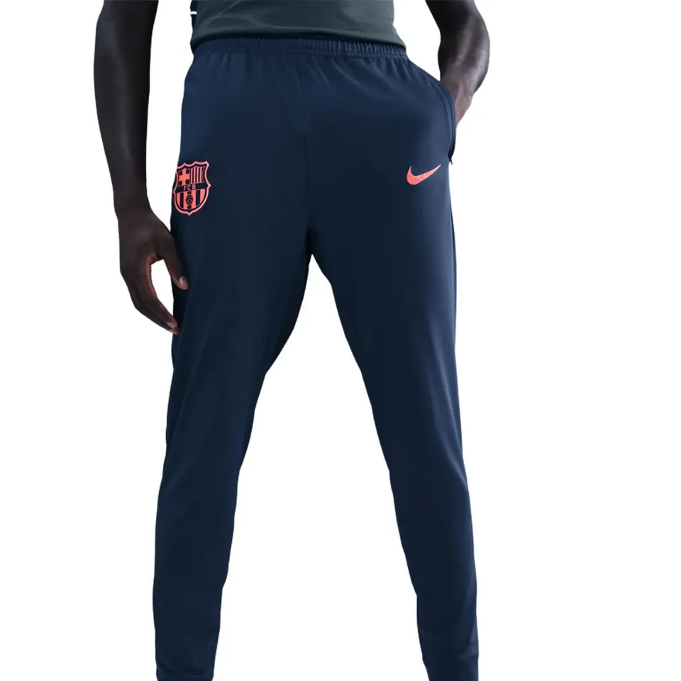 Barcelona Champions League tracksuit 2025 featuring stylish pants and team logo for fans