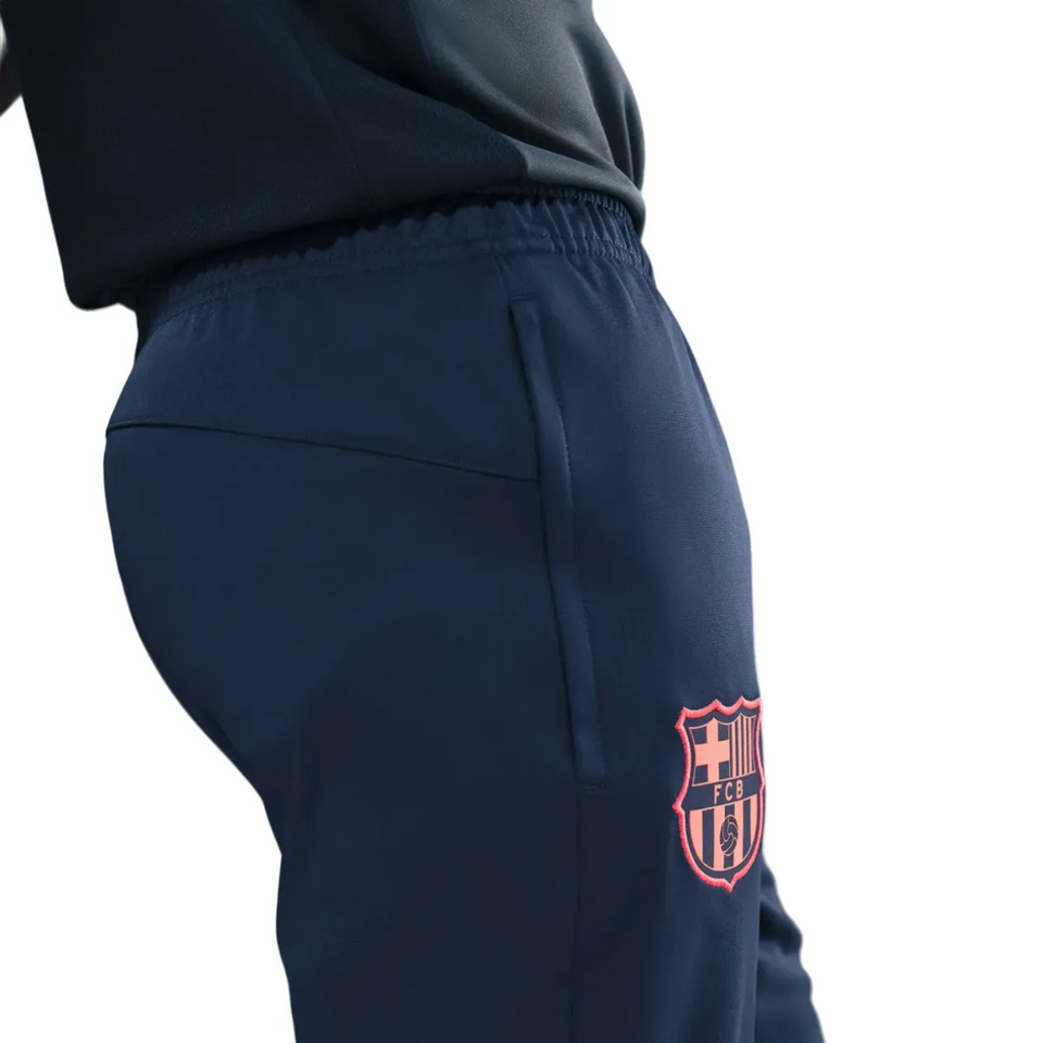 Close-up of Barcelona Champions League tracksuit 2025 featuring signature logo and comfortable fit