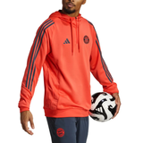 Bayern Munich hooded training tracksuit 2025 26 in coral with adidas stripes on SoccerTracksuits.com