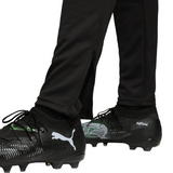 Close-up of Borussia Dortmund UCL tracksuit 2025 26 with black pants and detailed Puma cleats