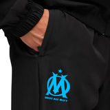 Close-up of Olympique Marseille tracksuit pocket with logo, perfect to buy Olympique Marseille tracksuit online