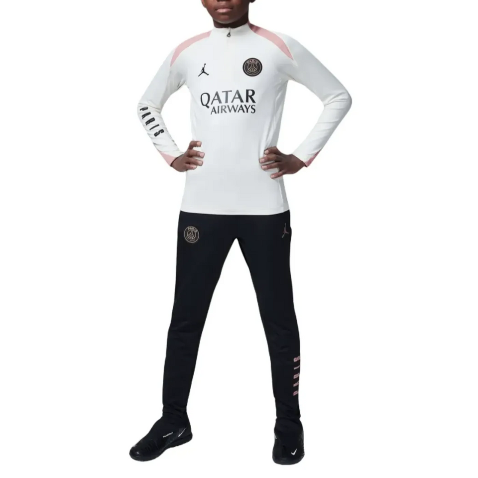 Kids wearing PSG Jordan tracksuit with white top and black bottoms. Buy PSG Jordan kids tracksuit online.