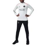 Kids wearing PSG Jordan tracksuit with white top and black bottoms. Buy PSG Jordan kids tracksuit online.