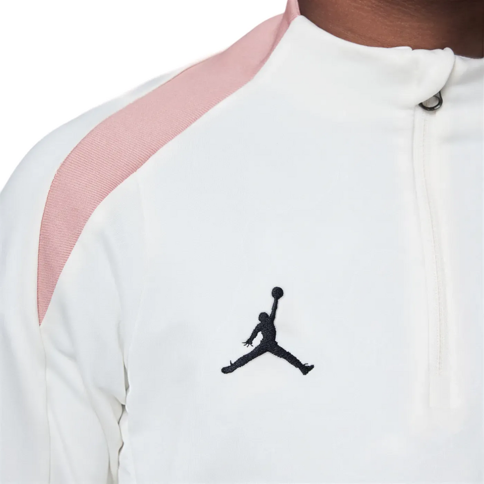 Close-up of PSG Jordan kids tracksuit featuring iconic Jumpman logo, perfect to buy PSG Jordan kids tracksuit online.