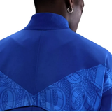 Back view of the Chelsea FC Nike Anthem jacket 2025 in vibrant blue designed for fans and players