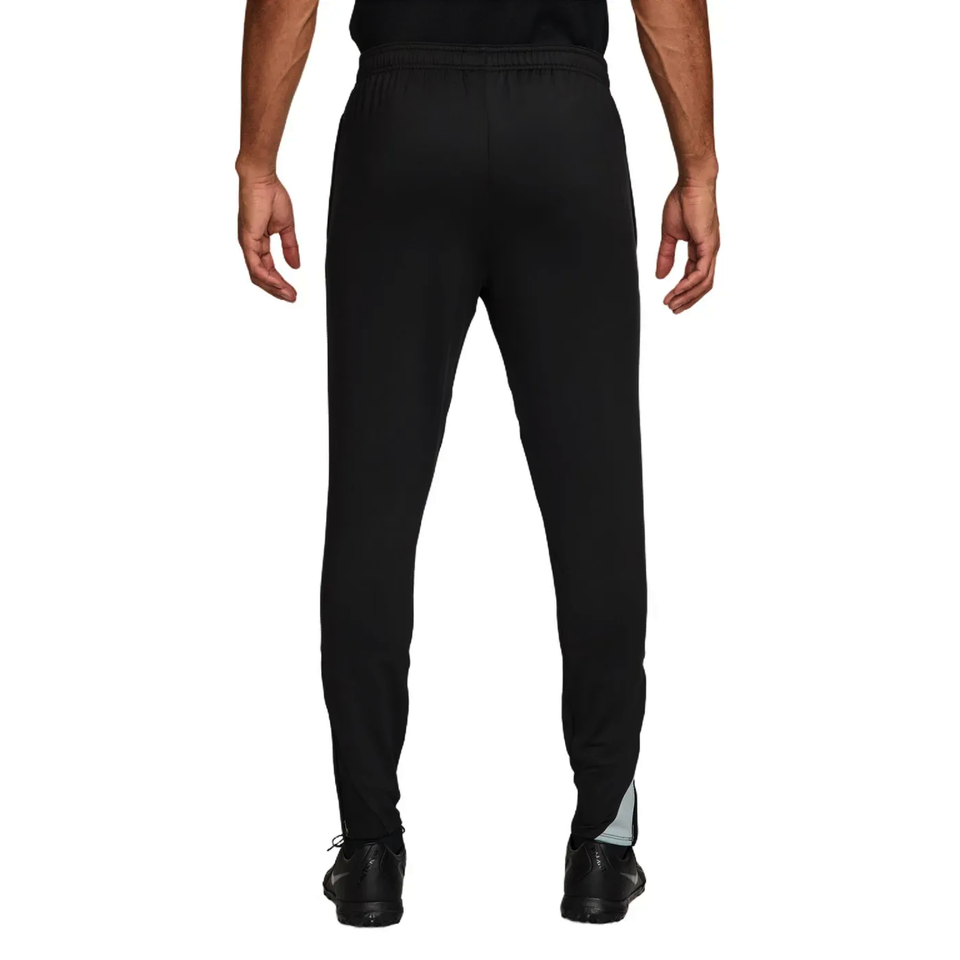 Back view of the Chelsea Total 90 training tracksuit 2025 showing sleek black design and comfortable fit