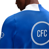 Chelsea Total 90 training tracksuit 2025 in blue featuring the CFC logo on the back