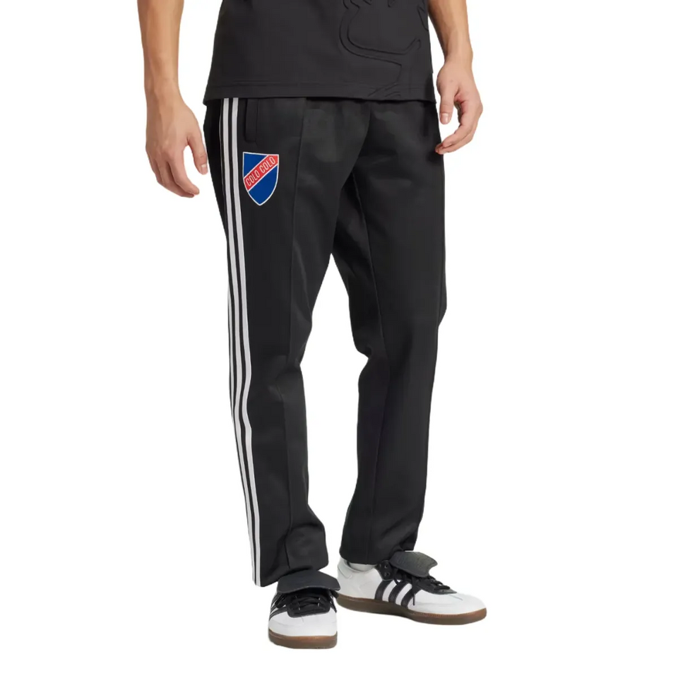 Colo Colo 100 years anniversary tracksuit featuring black pants with logo and striped design