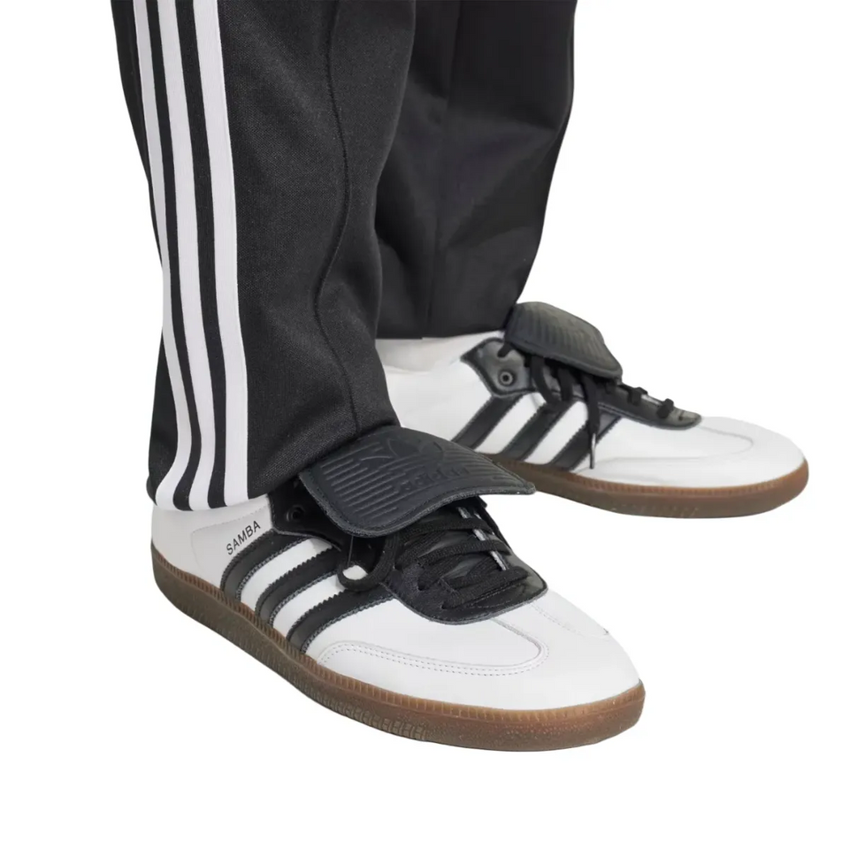 Colo Colo 100 years anniversary tracksuit featuring sporty black pants with white stripes