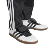 Colo Colo 100 years anniversary tracksuit featuring sporty black pants with white stripes