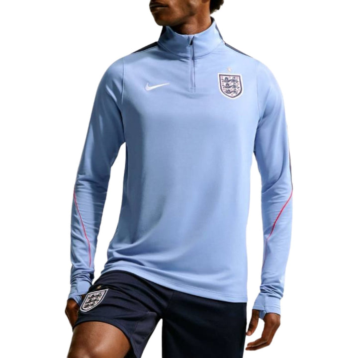 Authentic Nike England 2026/27 training soccer tracksuit set in light blue for adults, featuring a zip-up top and shorts.