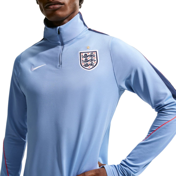 England training technical soccer tracksuit 2026/27 in light blue by Nike with official team logo and zip collar