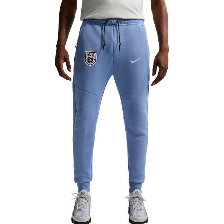 Blue Nike joggers with tapered fit and England national team logo