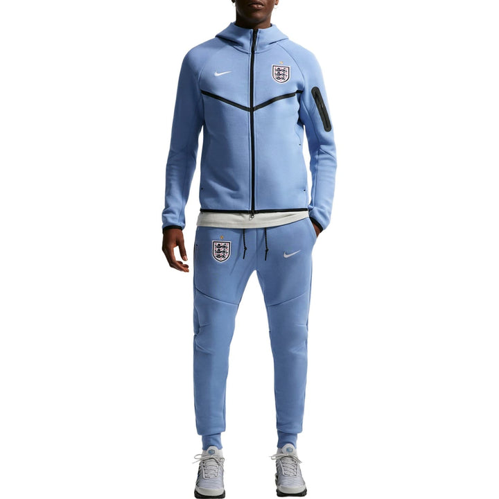 Light blue Nike tracksuit with zip-up hoodie and jogger pants