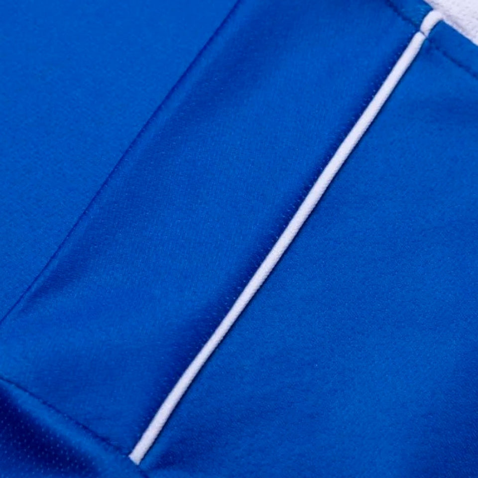 Close-up of the fabric detail on the Faroe Islands away soccer jersey 2024 in blue with white accents