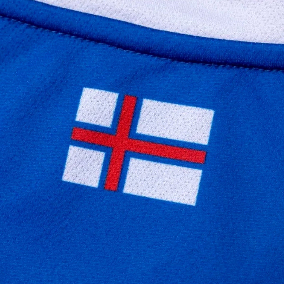 Close-up of the Faroe Islands away soccer jersey 2024 featuring the national flag design