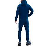 Model wearing FC Barcelona blue Tech Fleece tracksuit 2026 showcasing a sporty outdoor style