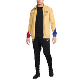 Men's FC Barcelona gold tracksuit 2024 with team logo and color-blocked sleeves for stylish fans