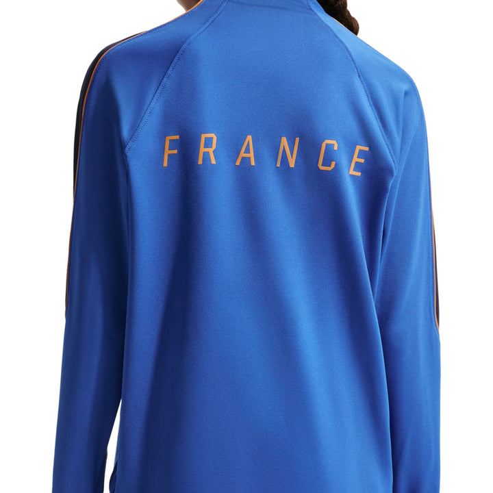 Blue athletic jacket with France lettering on the back in orange