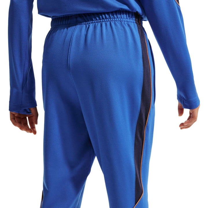 Blue athletic joggers with black side stripes and elastic waistband