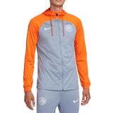 Inter Milan grey presentation tracksuit 2023 with orange accents and stylish fit for fans.