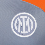 Close-up of Inter Milan grey presentation tracksuit 2023 logo showcasing detailed design and quality