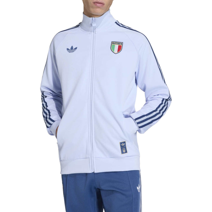 Light blue Adidas track jacket with Italy national team logo and three-stripe detailing on sleeves